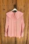 Comprar Camisa rosa cuello babero.